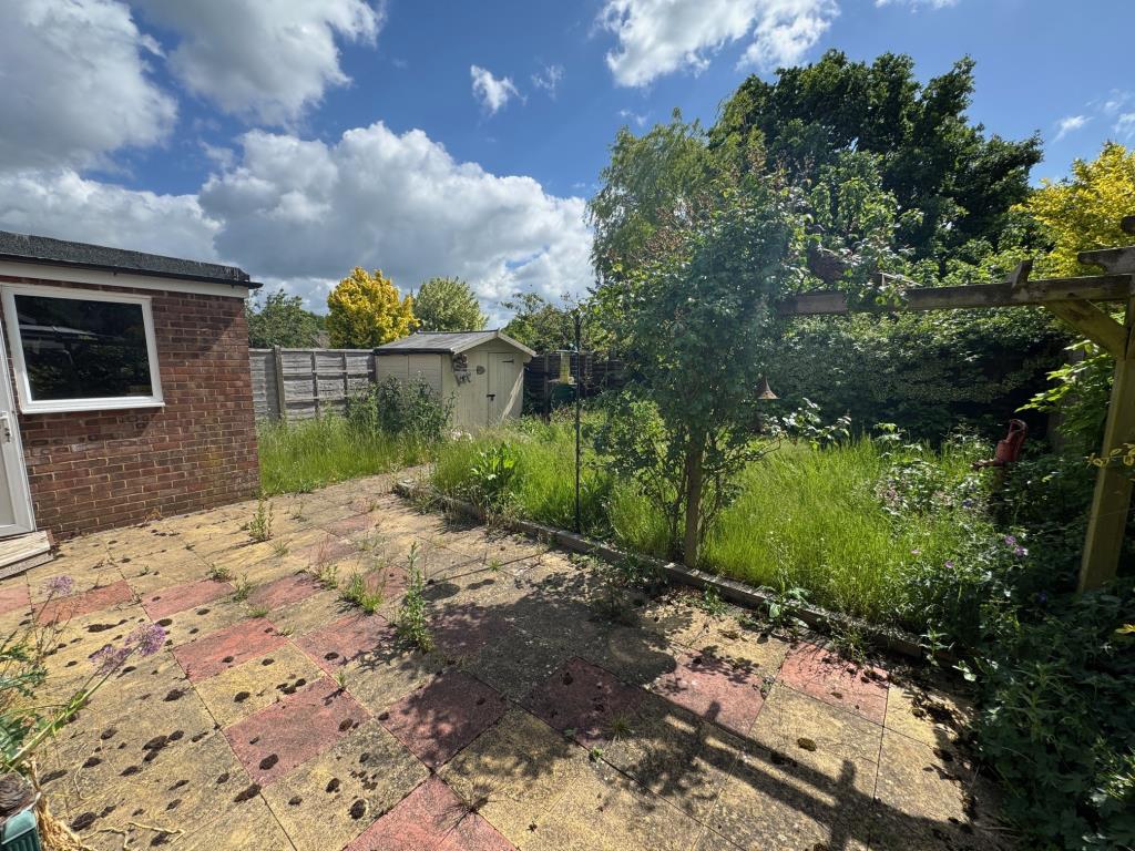 Lot: 142 - TWO-BEDROOM SEMI-DETACHED BUNGALOW WITH GARAGE - Rear garden alternative view
